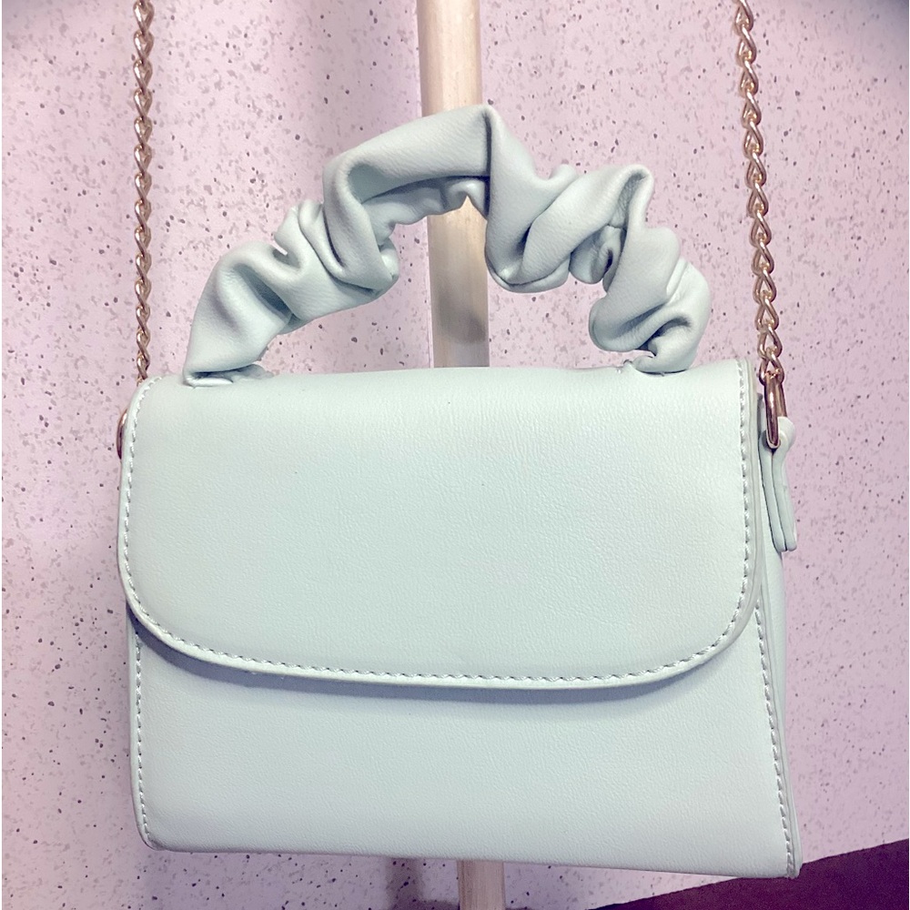 Baby blue evening bag with goldtone crossbody chain